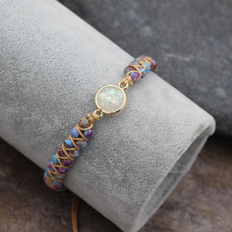 Detailed view of the natural stone beads and central opalescent stone, showcasing intricate craftsmanship.